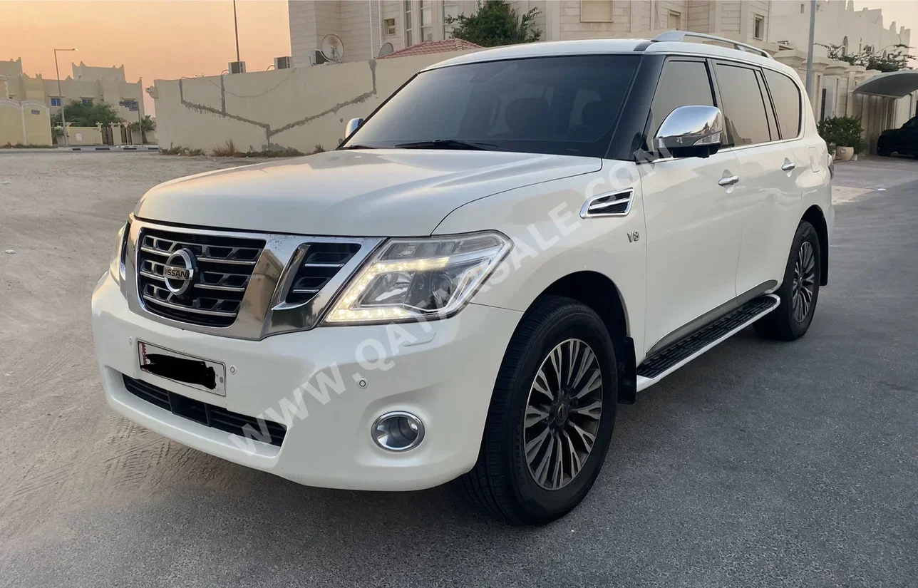 Nissan  Patrol  Platinum  2014  Automatic  200,000 Km  8 Cylinder  Four Wheel Drive (4WD)  SUV  White