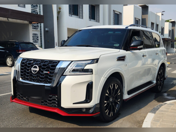 Nissan  Patrol  Nismo  2021  Automatic  124,000 Km  8 Cylinder  Four Wheel Drive (4WD)  SUV  White  With Warranty