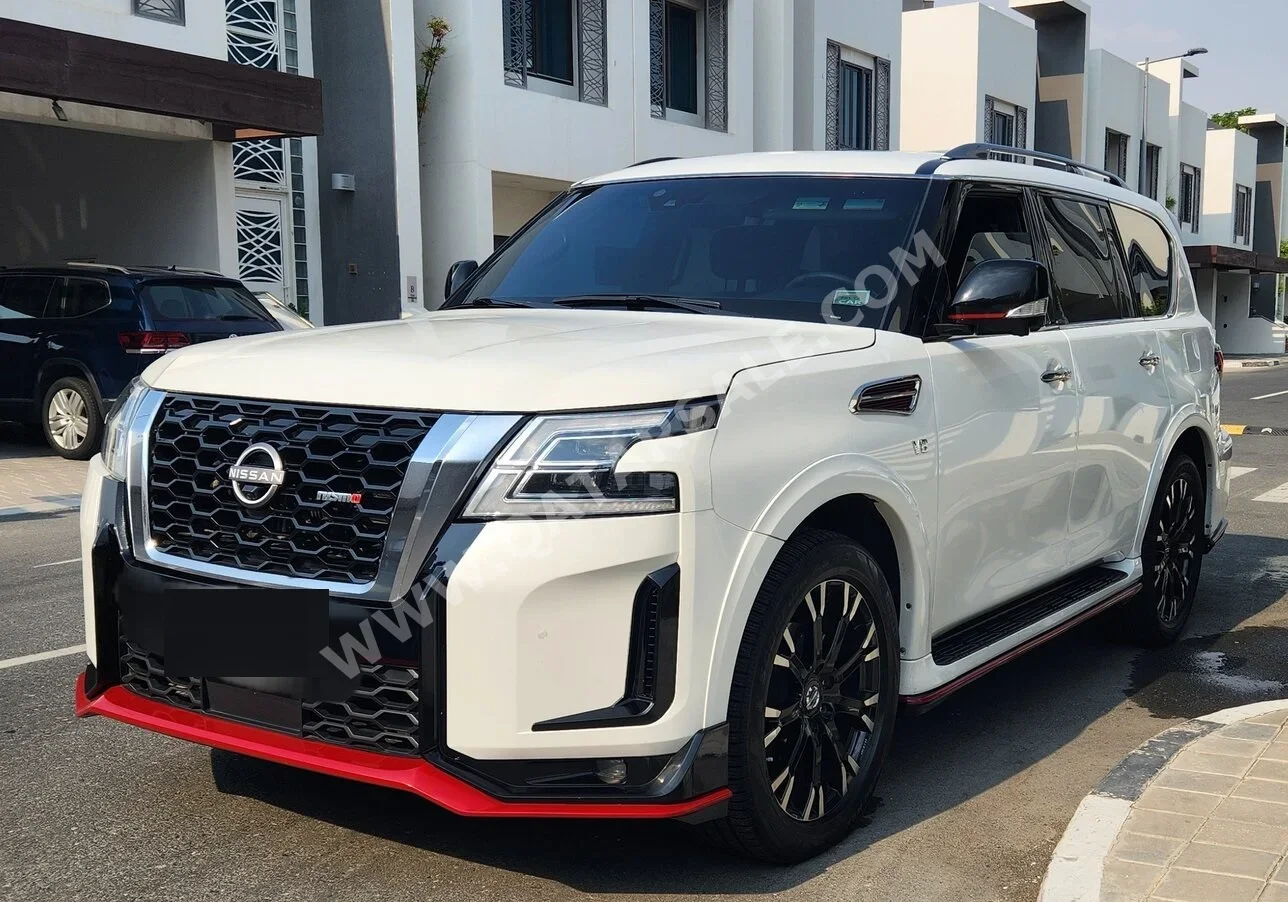 Nissan  Patrol  Nismo  2021  Automatic  124,000 Km  8 Cylinder  Four Wheel Drive (4WD)  SUV  White  With Warranty