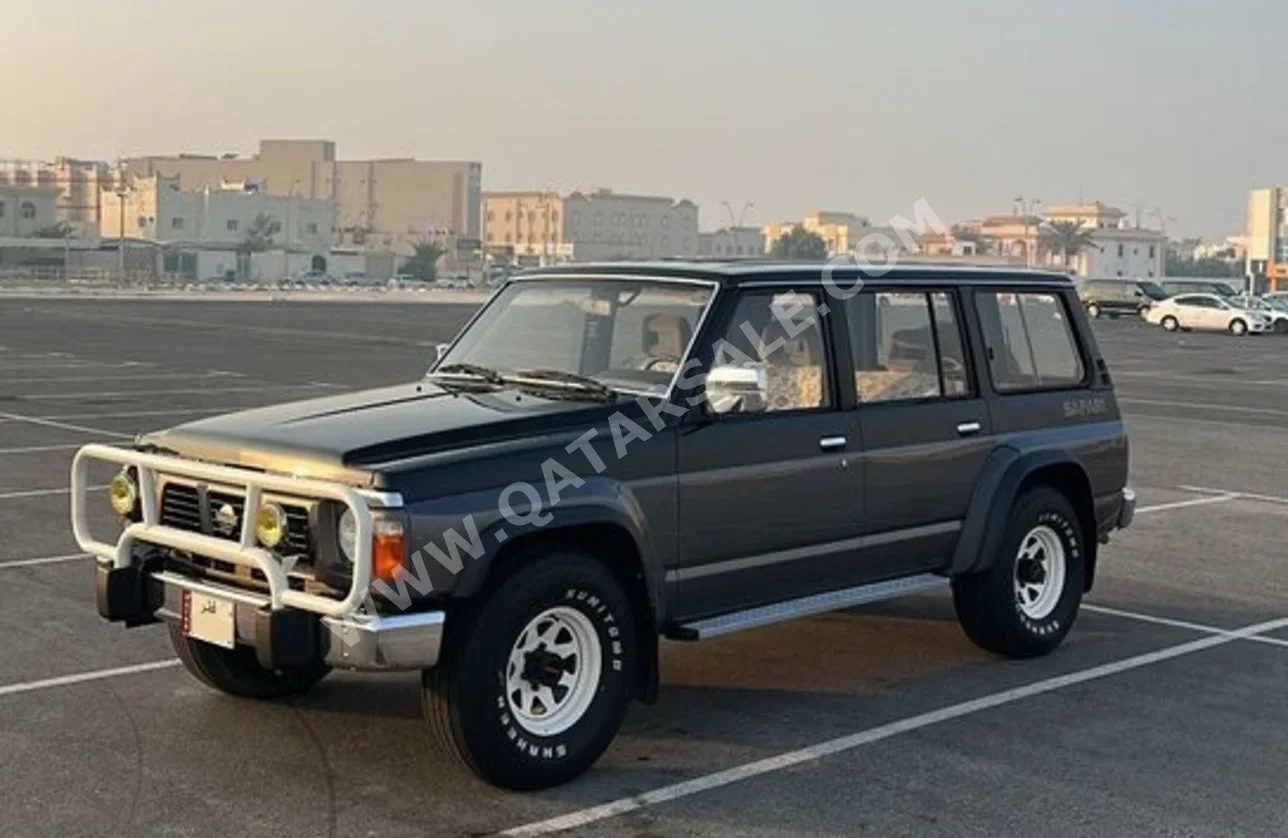 Nissan  Patrol  Super Safari  1991  Manual  4,500 Km  6 Cylinder  Rear Wheel Drive (RWD)  SUV  Black and Gray