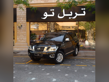 Nissan  Patrol  SE  2014  Automatic  390,500 Km  8 Cylinder  Four Wheel Drive (4WD)  SUV  Black