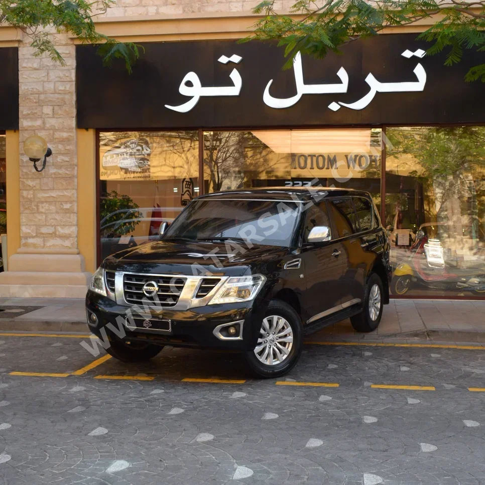 Nissan Patrol SE 2014 Automatic 390,500 Km 8 Cylinder Four Wheel Drive (4WD) SUV Black