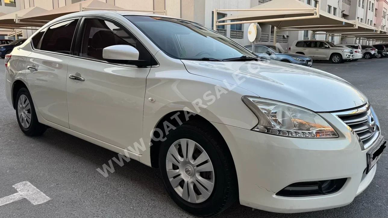 نيسان سنترا 2016 اوتوماتيك 119,700 كم 4 سلندر سحب امامي سيدان أبيض