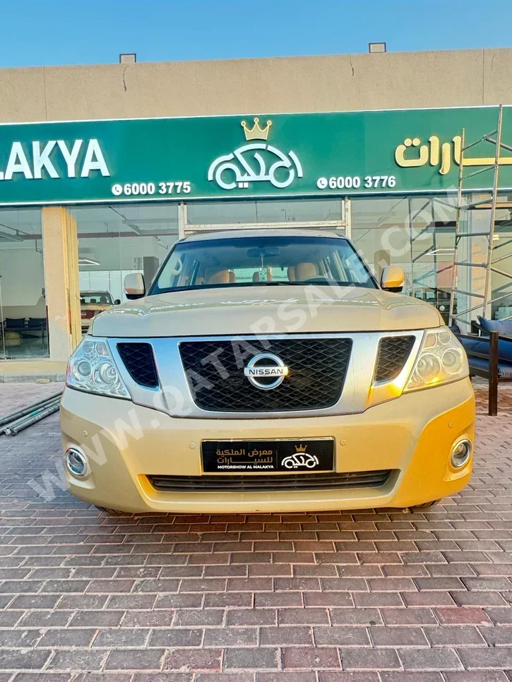 Nissan  Patrol  SE  2012  Automatic  290,000 Km  8 Cylinder  Four Wheel Drive (4WD)  SUV  Gold