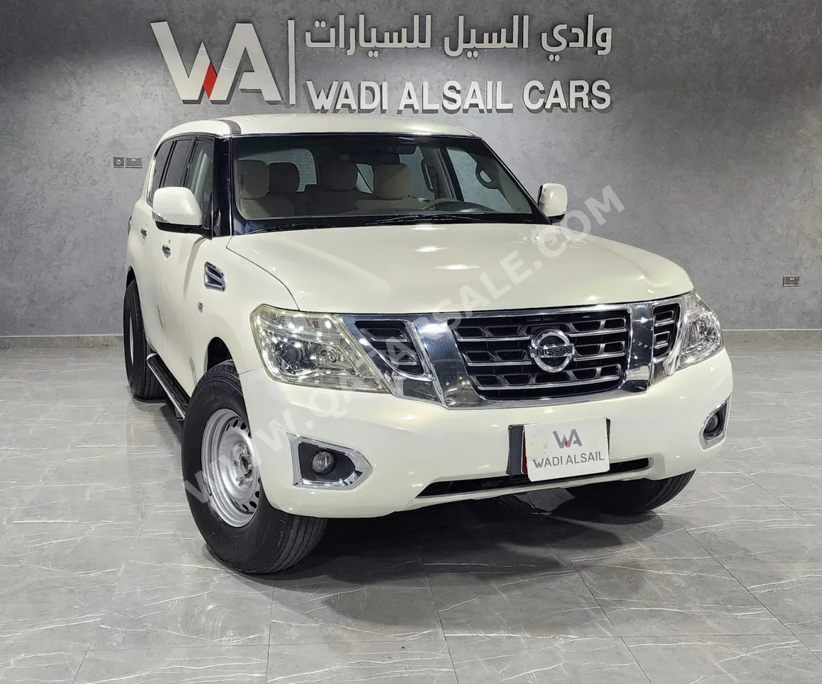 Nissan  Patrol  SE  2013  Manual  160,000 Km  8 Cylinder  Four Wheel Drive (4WD)  SUV  White