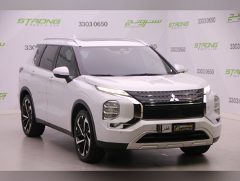 ميتسوبيشي أوت لاندر اتش ال + 2024 اوتوماتيك 13,000 كم 4 سلندر دفع رباعي اس يو في أبيض لؤلؤي تحت الضمان