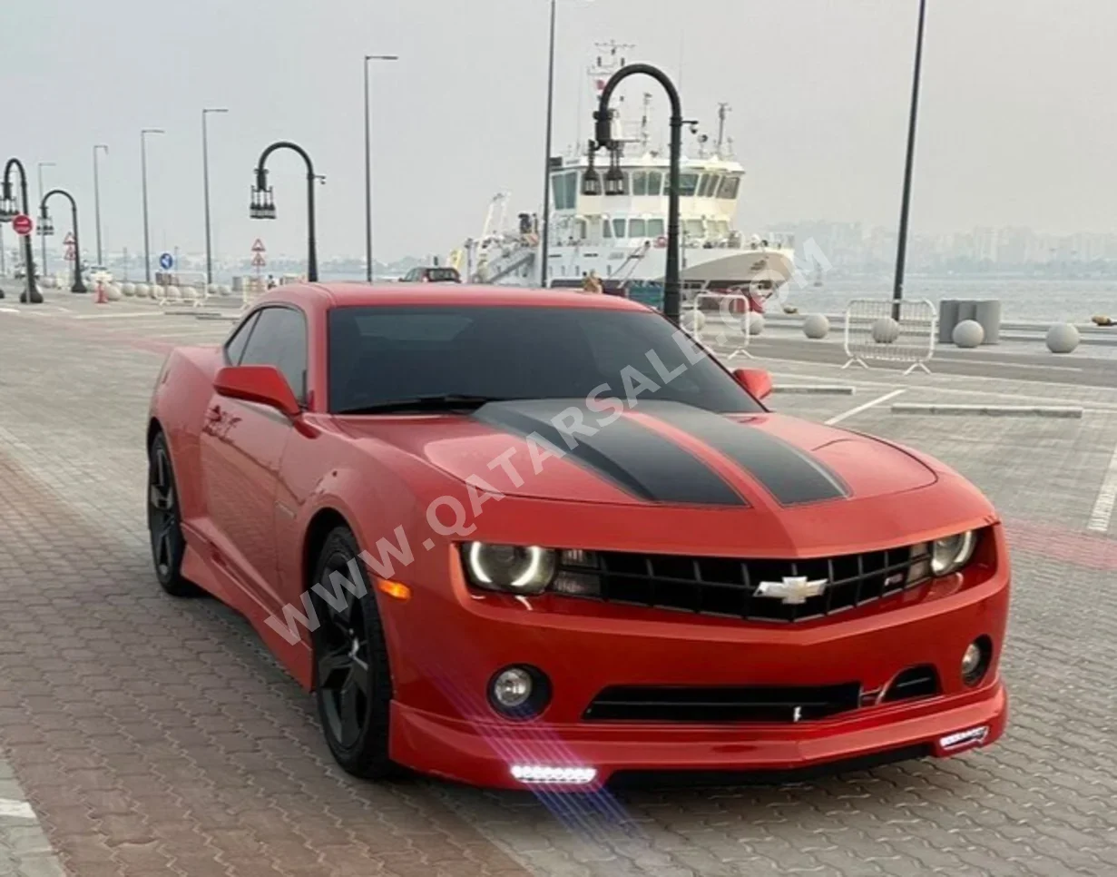 شفروليه  كمارو  ار اس  2012  اوتوماتيك  84,100 كم  6 سلندر  دفع خلفي  كوبيه \ سبورت  برتقالي