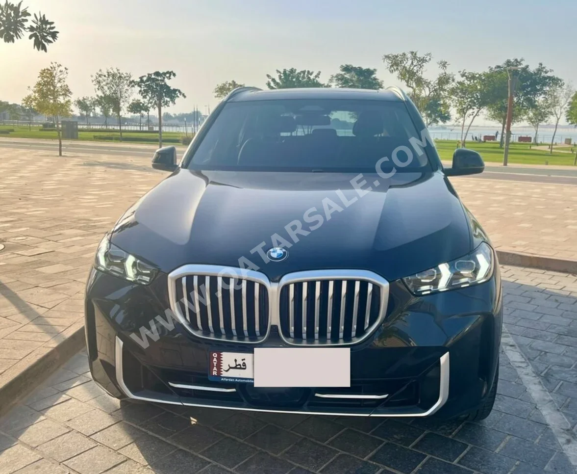 بي ام دبليو الفئة - اكس اكس 5 40 اي 2024 اوتوماتيك 18,000 كم 6 سلندر دفع رباعي اس يو في أسود تحت الضمان