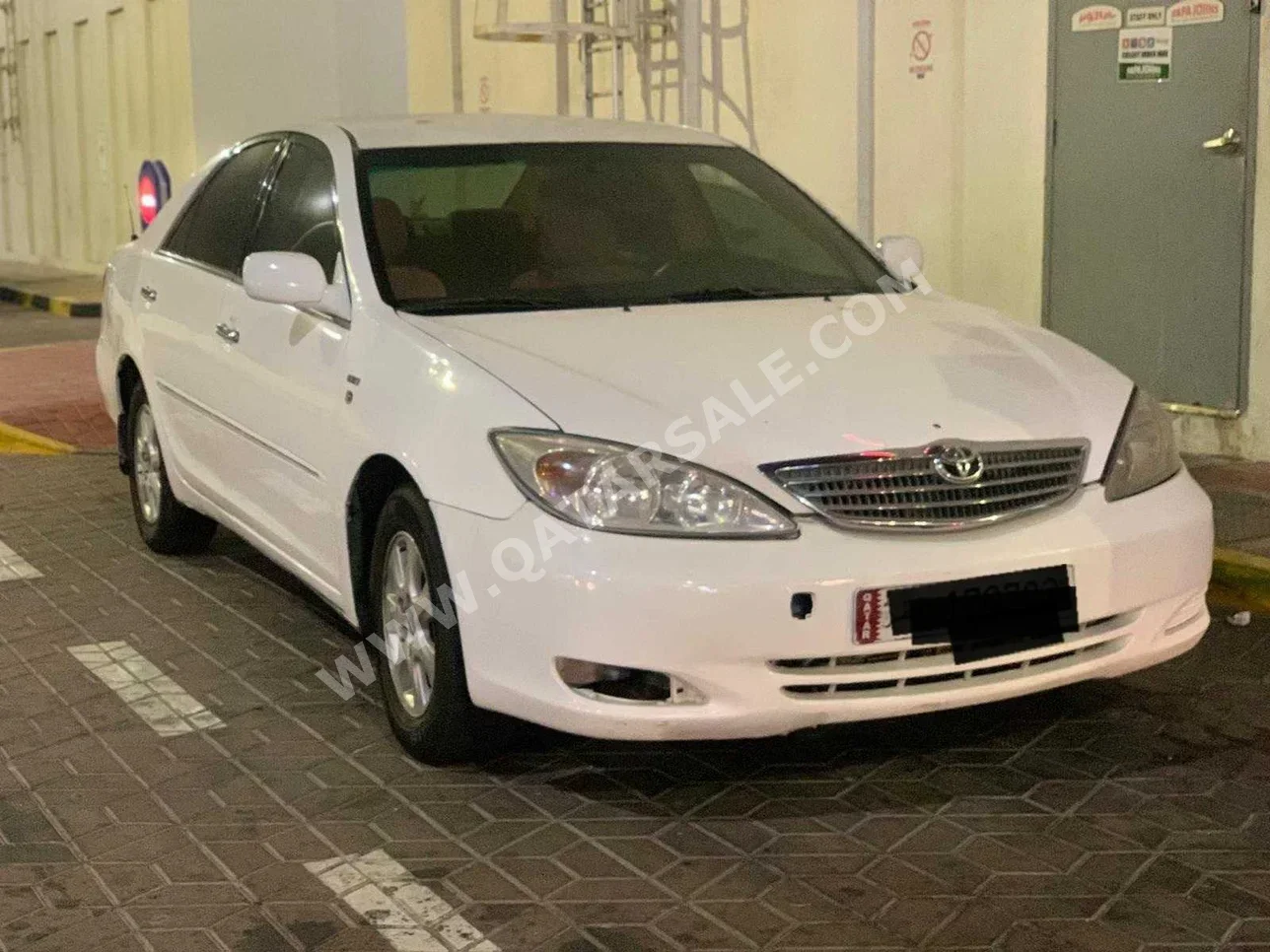 Toyota  Camry  GL  2004  Automatic  379,000 Km  4 Cylinder  Front Wheel Drive (FWD)  Sedan  White