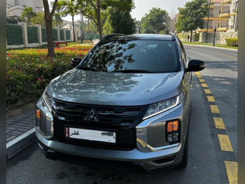 Mitsubishi  ASX  2023  Automatic  26,929 Km  4 Cylinder  All Wheel Drive (AWD)  SUV  Silver and Black  With Warranty