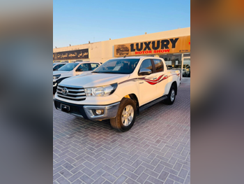 Toyota  Hilux  2020  Automatic  62,000 Km  4 Cylinder  Four Wheel Drive (4WD)  Pick Up  White