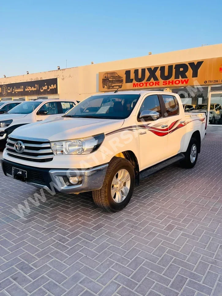 Toyota  Hilux  2020  Automatic  62,000 Km  4 Cylinder  Four Wheel Drive (4WD)  Pick Up  White