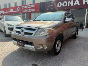 Toyota  Hilux  2008  Automatic  385,000 Km  4 Cylinder  Four Wheel Drive (4WD)  Pick Up  Gold
