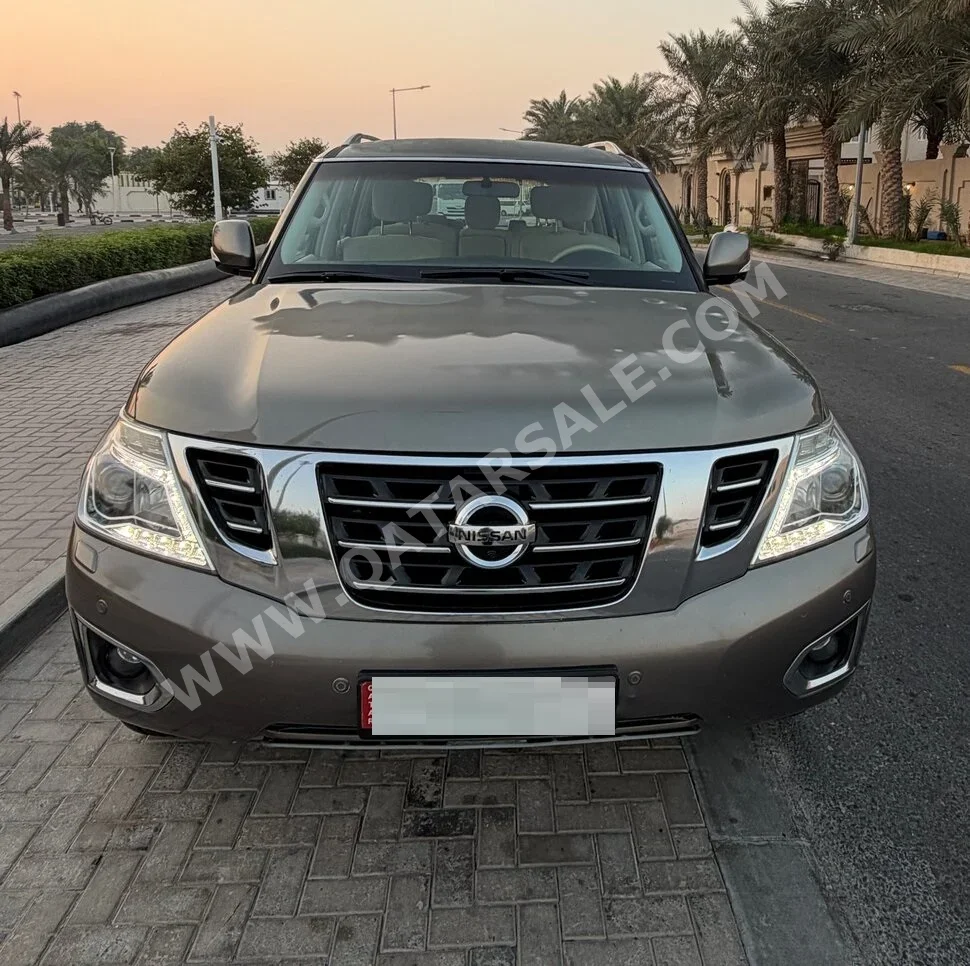 نيسان باترول ال اي 2017 اوتوماتيك 92,000 كم 8 سلندر دفع رباعي اس يو في رمادي