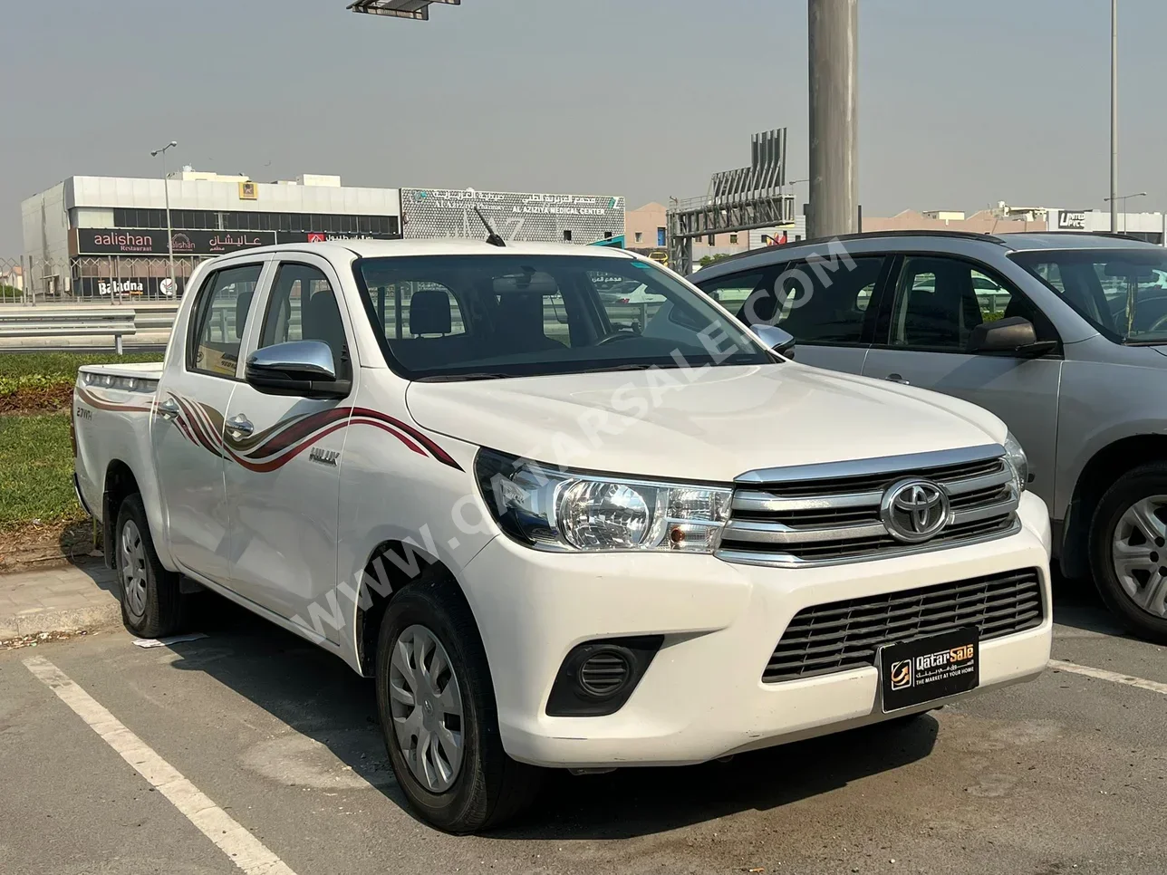 Toyota  Hilux  2021  Automatic  179,000 Km  4 Cylinder  Four Wheel Drive (4WD)  Pick Up  White