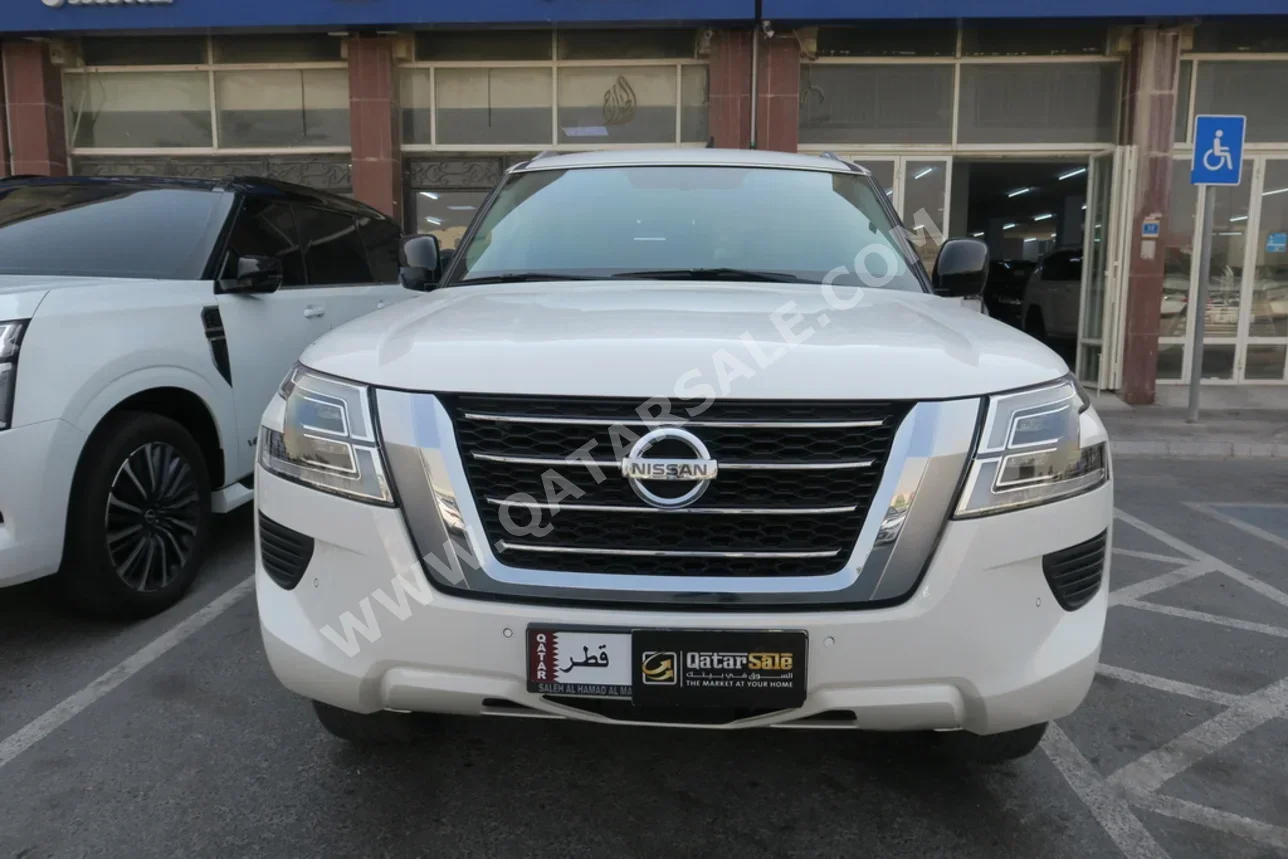 نيسان باترول أكس أي 2021 اوتوماتيك 115,000 كم 6 سلندر دفع رباعي اس يو في أبيض