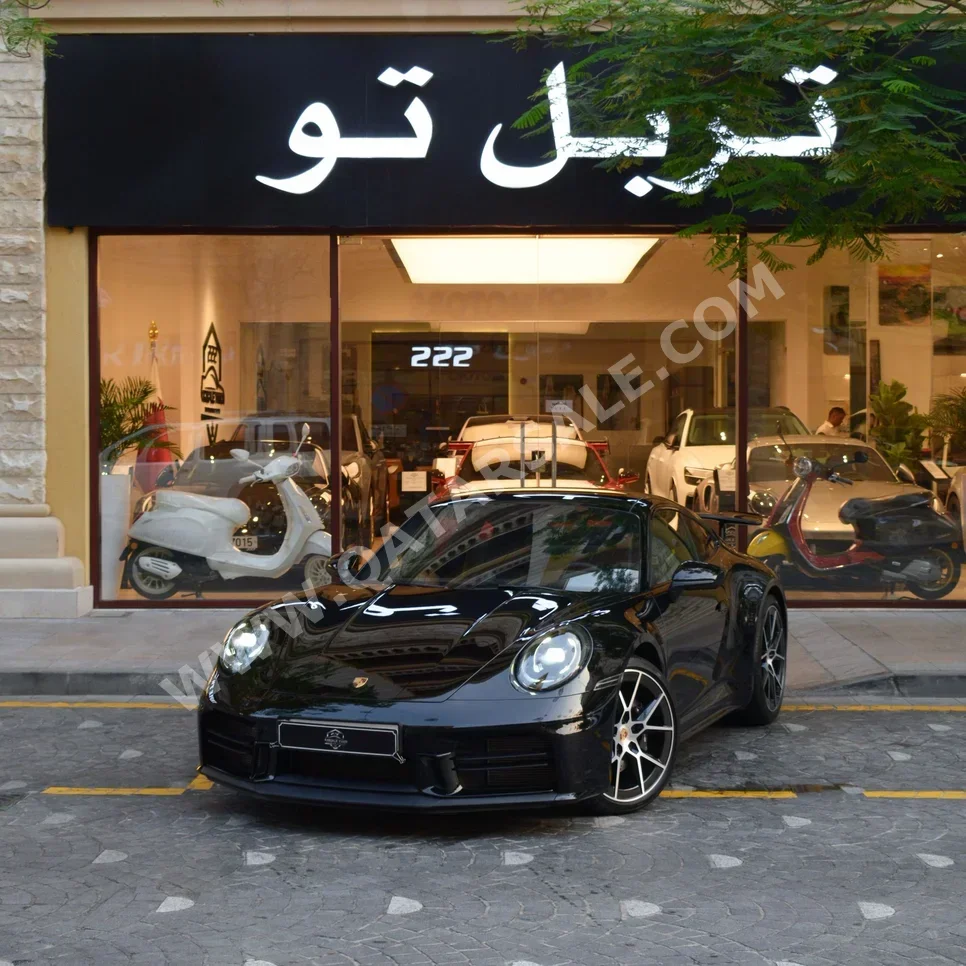 Porsche  911  Carrera  2025  Automatic  5,500 Km  6 Cylinder  Rear Wheel Drive (RWD)  Coupe / Sport  Black  With Warranty