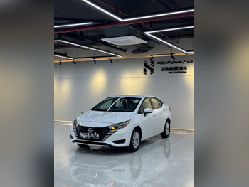 نيسان صني 2024 اوتوماتيك 0 كم 4 سلندر سحب امامي سيدان أبيض تحت الضمان