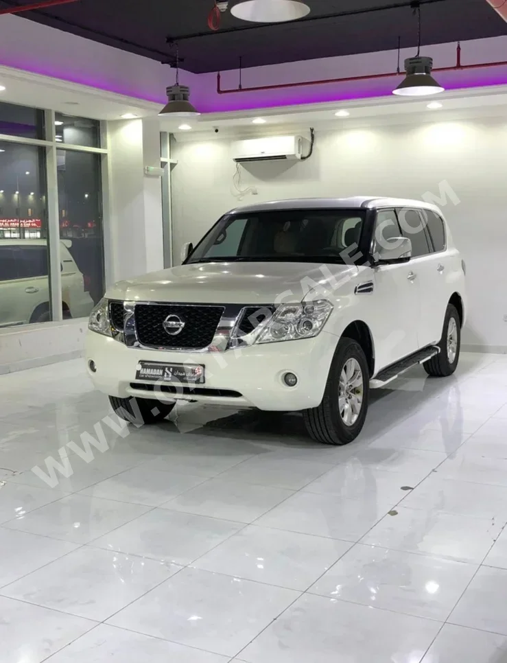 Nissan  Patrol  SE  2012  Automatic  326,000 Km  8 Cylinder  Four Wheel Drive (4WD)  SUV  White