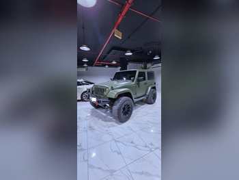 Jeep  Wrangler  2009  Manual  220,000 Km  6 Cylinder  Four Wheel Drive (4WD)  SUV  Olive Green