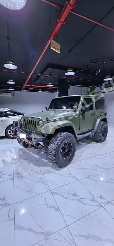 Jeep  Wrangler  2009  Manual  220,000 Km  6 Cylinder  Four Wheel Drive (4WD)  SUV  Olive Green