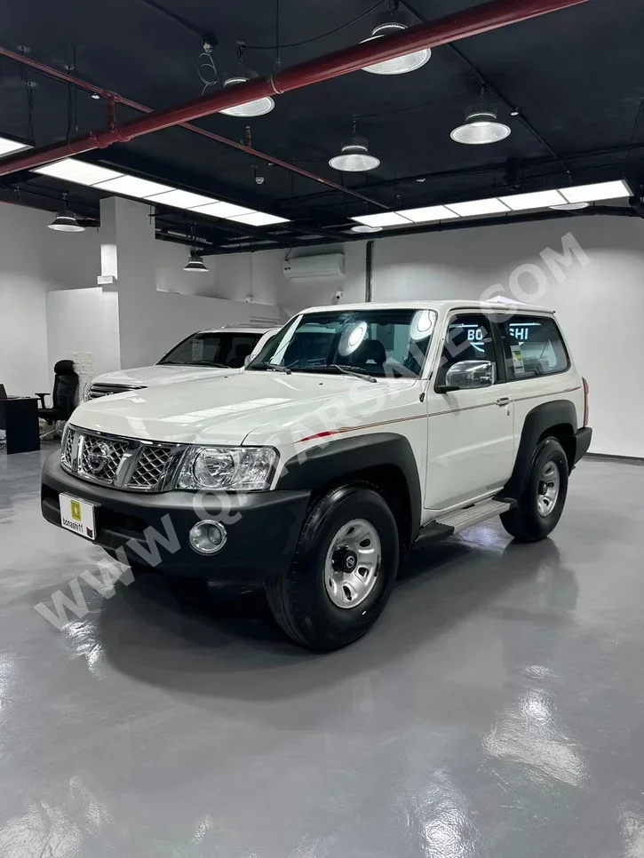 نيسان باترول جي ال 2015 عادي 337,197 كم 6 سلندر دفع رباعي اس يو في أبيض