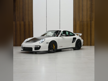 بورش  911  جي تي 2 ار اس  2011  اوتوماتيك  1,900 كم  6 سلندر  دفع خلفي  كوبيه \ سبورت  أبيض