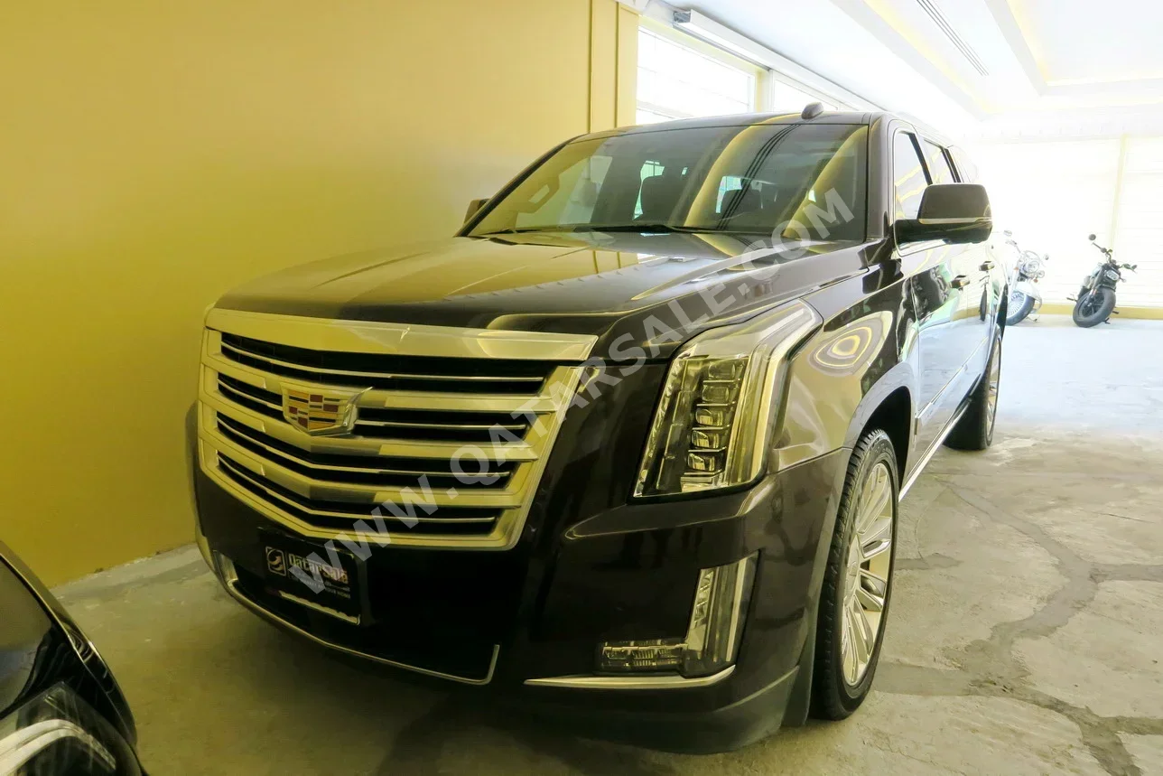 Cadillac  Escalade  Platinum  2015  Automatic  188,000 Km  8 Cylinder  Four Wheel Drive (4WD)  SUV  Gray