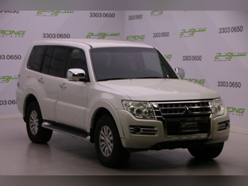 ميتسوبيشي  باجيرو  2015  اوتوماتيك  99,000 كم  6 سلندر  دفع رباعي  اس يو في  أبيض