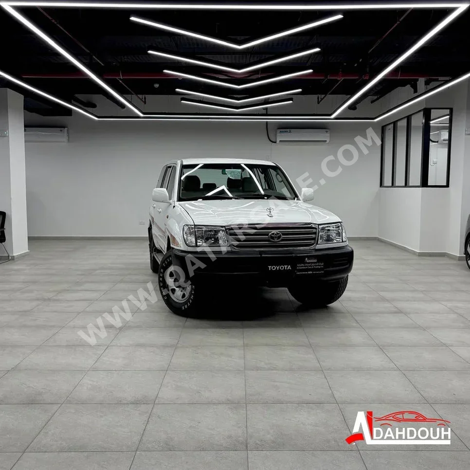 تويوتا لاند كروزر جي اكس 2004 عادي 272,000 كم 6 سلندر دفع رباعي اس يو في أبيض