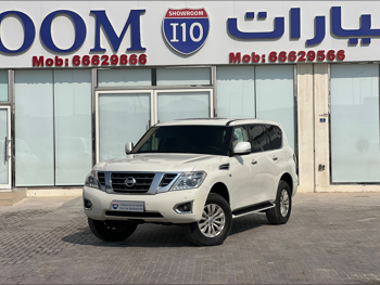 Nissan  Patrol  SE  2015  Automatic  210,000 Km  8 Cylinder  Four Wheel Drive (4WD)  SUV  White