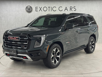 جي ام سي يوكون اي تي 4 2025 اوتوماتيك 5,500 كم 8 سلندر دفع رباعي اس يو في رمادي تحت الضمان