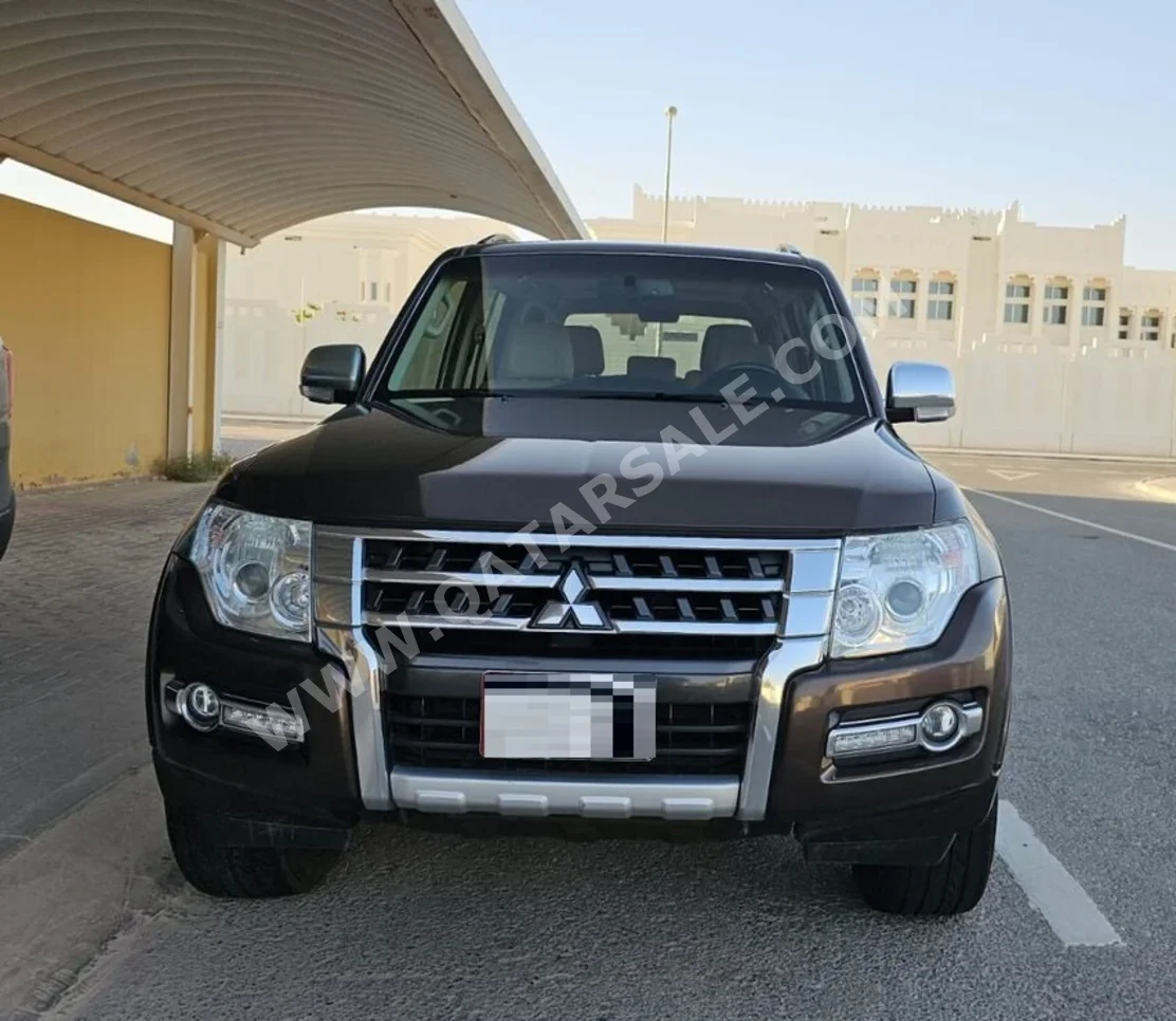 ميتسوبيشي باجيرو 3.8 2018 اوتوماتيك 128,000 كم 6 سلندر دفع رباعي اس يو في بني