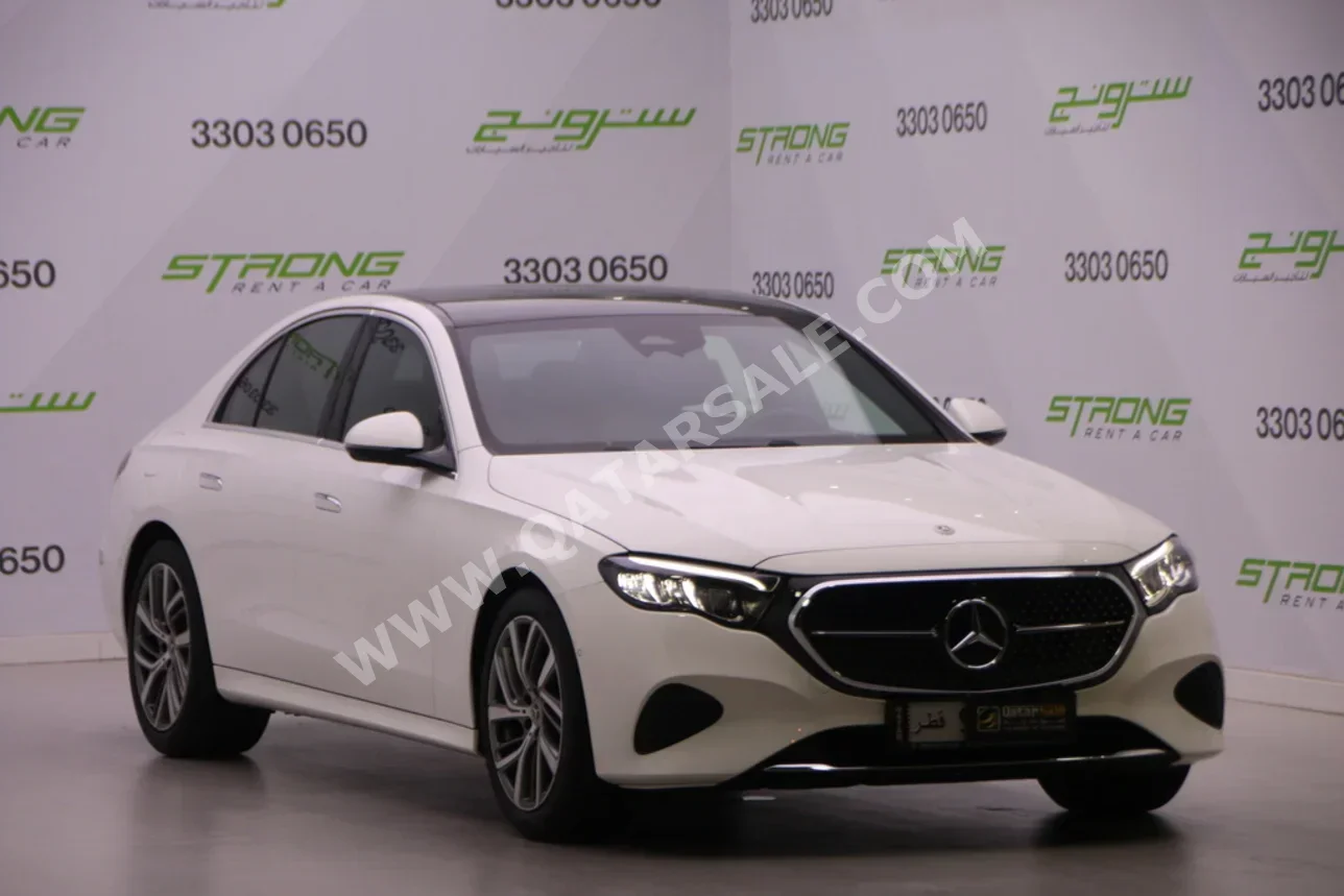 مرسيدس - بنز اي - كلاس 200 2024 اوتوماتيك 6,000 كم 4 سلندر دفع خلفي سيدان أبيض تحت الضمان