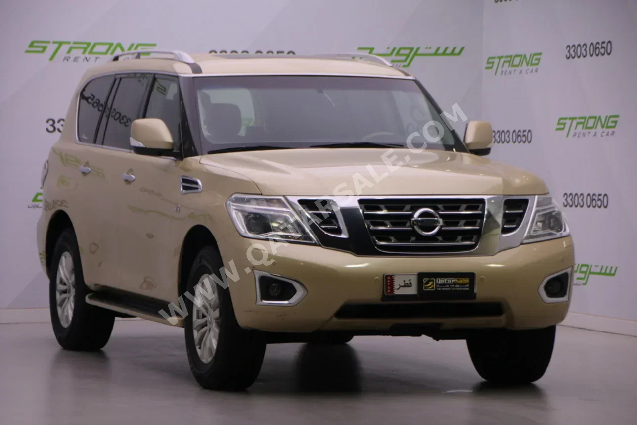 نيسان باترول اس اي 2015 اوتوماتيك 220,000 كم 8 سلندر دفع رباعي اس يو في ذهبي