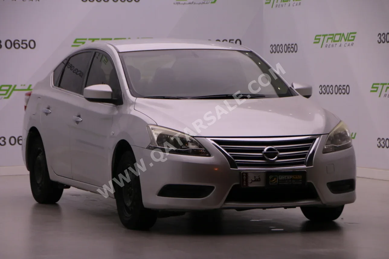 نيسان سنترا 2015 اوتوماتيك 147,000 كم 4 سلندر سحب امامي سيدان فضي