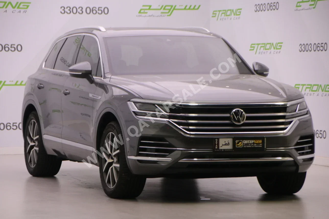 فوكس واغن طوارق R line 2019 اوتوماتيك 117,000 كم 6 سلندر دفع كلي مستمر اس يو في رمادي
