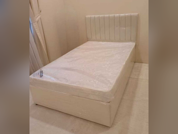 الأسّرة - فردي  - الأصفر  - متضمنة المرتبة