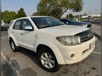 Toyota  Fortuner  2011  Automatic  310 Km  4 Cylinder  Four Wheel Drive (4WD)  SUV  White