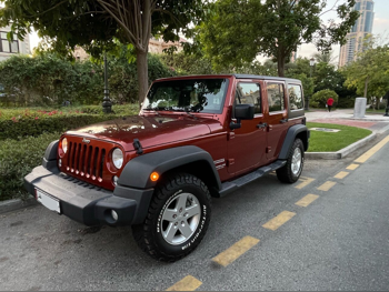 Jeep Wrangler Unlimited 2014 Automatic 150,000 Km 6 Cylinder Four Wheel Drive (4WD) SUV Dark Red