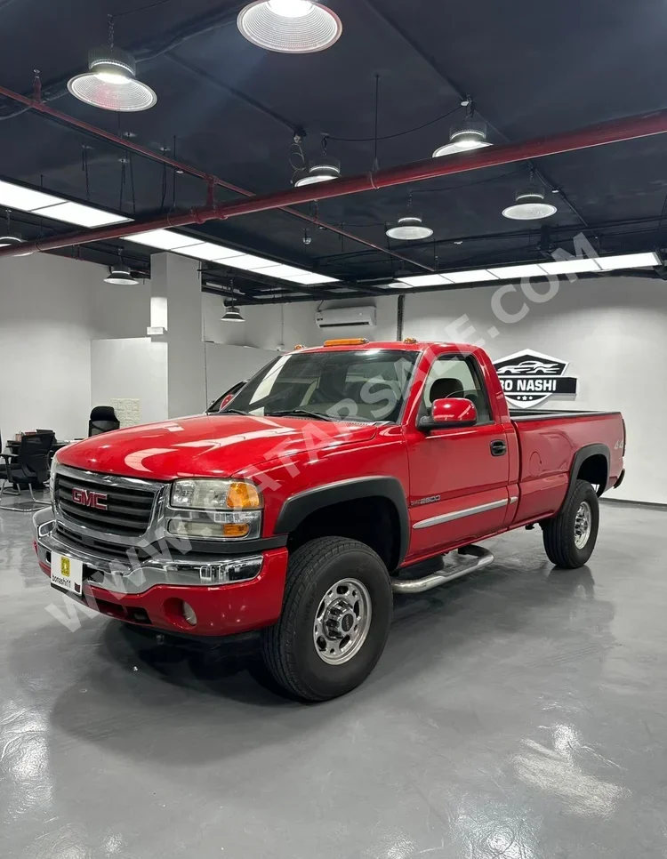 جي ام سي سييرا 2500 HD 2006 اوتوماتيك 228,000 كم 8 سلندر دفع رباعي بيكب أحمر