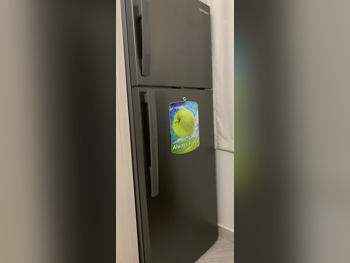 افترون ثلاجة بفريزر علوي