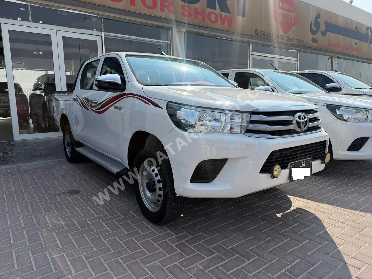 تويوتا هاي لوكس 2021 اوتوماتيك 42,000 كم 4 سلندر دفع رباعي بيكب أبيض