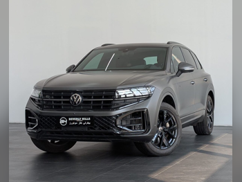 فوكس واغن  طوارق  R line  2024  اوتوماتيك  26,681 كم  6 سلندر  دفع رباعي  اس يو في  رمادي  تحت الضمان