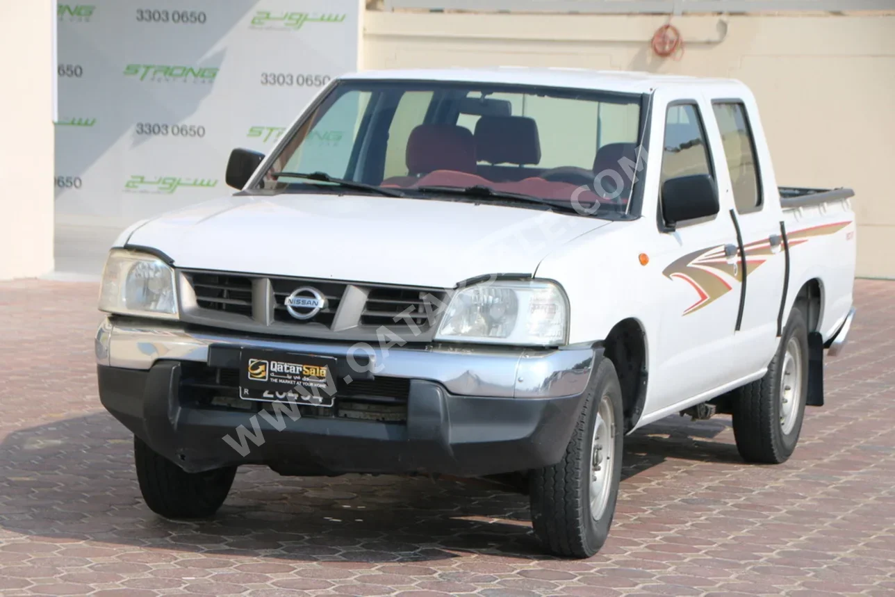 نيسان بيك أب 2016 عادي 346,000 كم 4 سلندر دفع خلفي بيكب أبيض