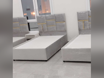 الأسّرة - فردي  - اللون الرمادي  - متضمنة المرتبة