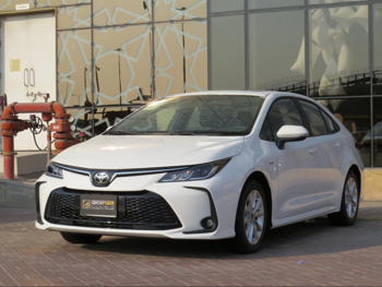 Toyota  Corolla  Hybrid  2025  Automatic  0 Km  4 Cylinder  Front Wheel Drive (FWD)  Sedan  White  With Warranty