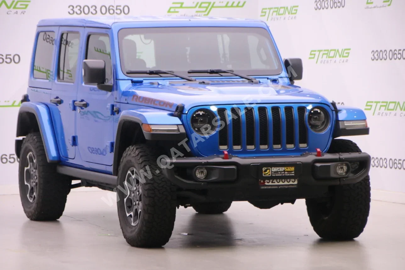 جييب رانجلار روبيكون 2023 اوتوماتيك 32,000 كم 6 سلندر دفع رباعي اس يو في ازرق تحت الضمان
