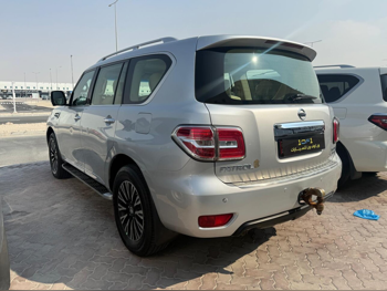 Nissan  Patrol  Platinum  2014  Automatic  331,000 Km  8 Cylinder  Four Wheel Drive (4WD)  SUV  Silver