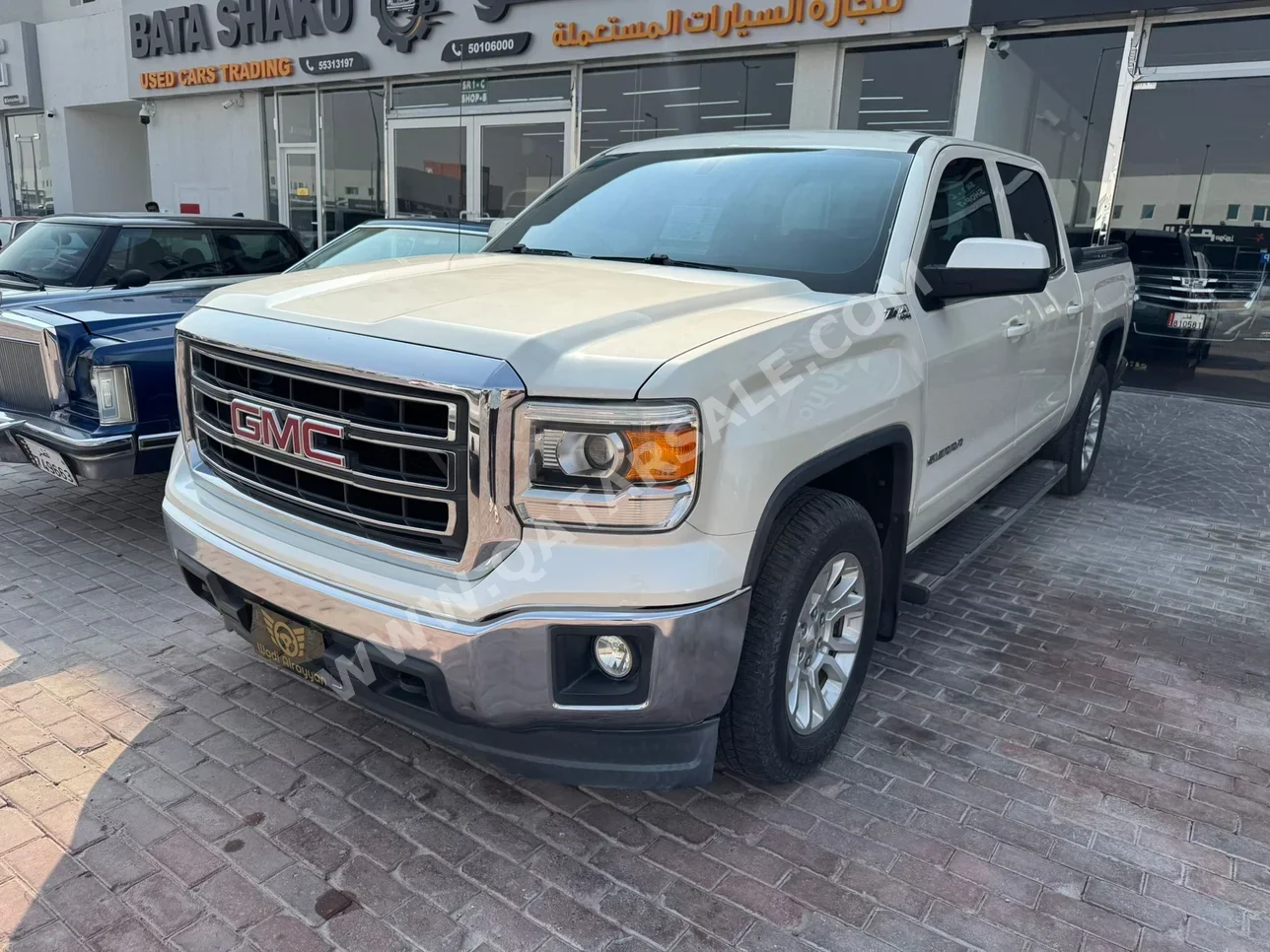 جي ام سي  سييرا  اس ال اي  2014  اوتوماتيك  339,000 كم  8 سلندر  دفع رباعي  بيكب  أبيض